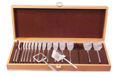 Prism Set of 22 with Stainless Steel Sticks,  in Wooden Box with Cherry finish. Includes: RED, 1/2, 1, 2, 3, 4, 5, 6, 7, 8, 9, 10, 12, 14, 16, 18, 20, 25, 30, 35, 40, 45, 50. Size: 37MM Sq.
